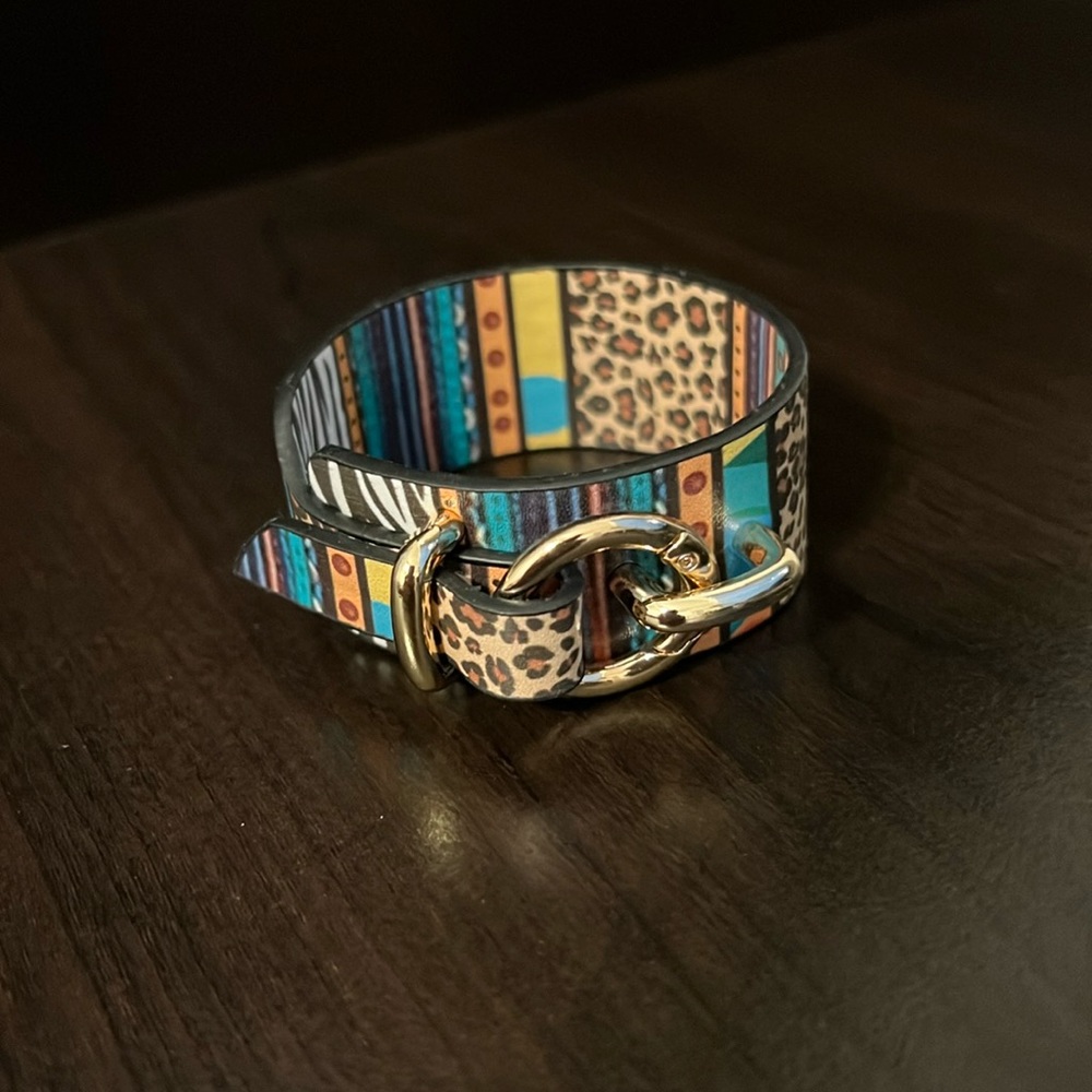Gorgeous cuff with gold hardware! Leopard print is so hot right now!